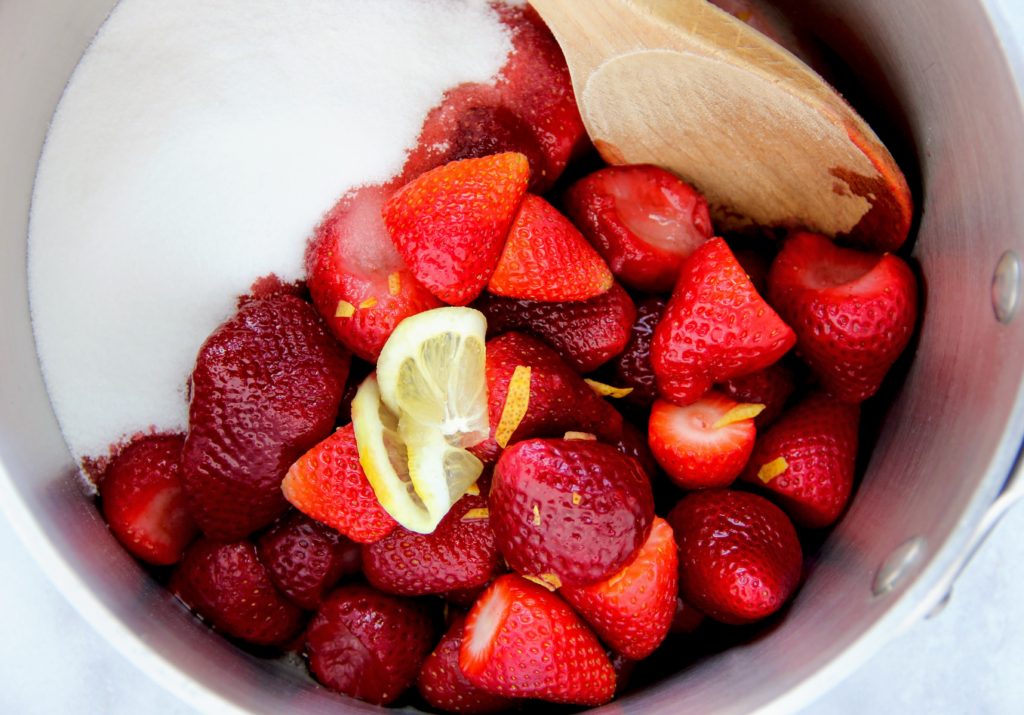 lemon ricotta pancakes with strawberry sauce by lindsay johnson of lady in the wild west for gen padalecki of now & gen wife of jared padalecki strawberries and sugar