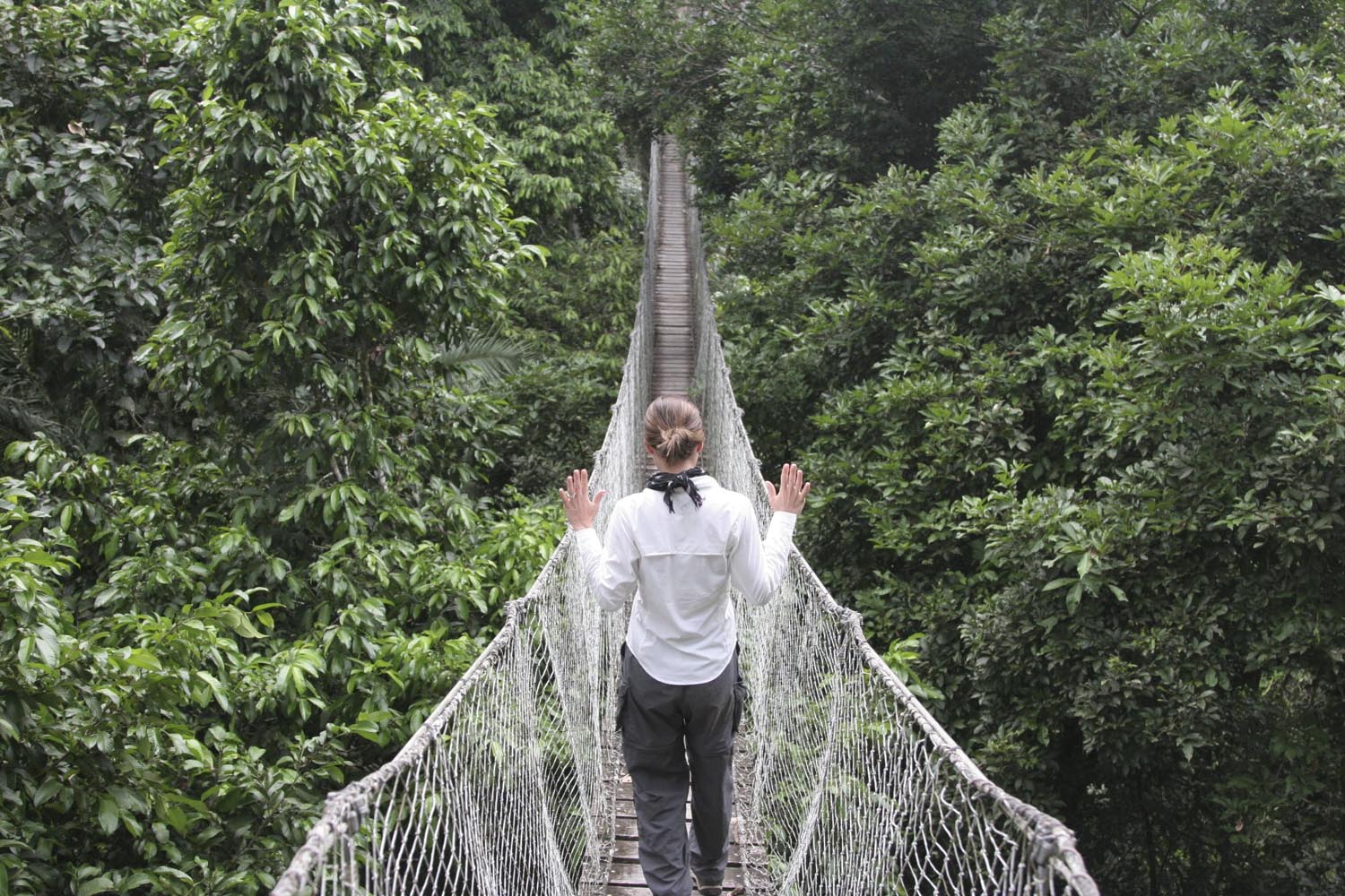 Gen Padalecki walking over rope bridge in Machu Picchu